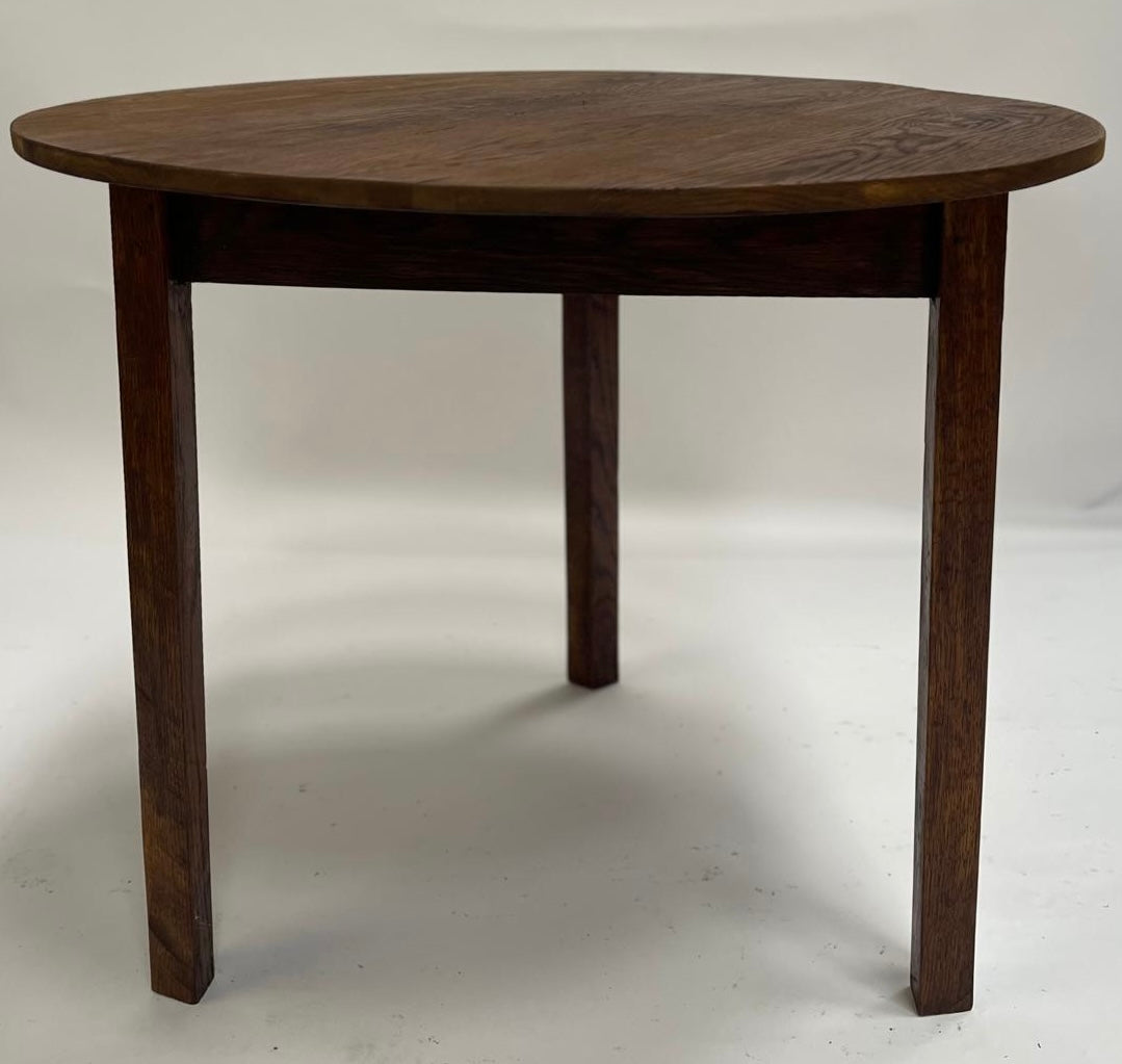 A mid century Oak Cricket table