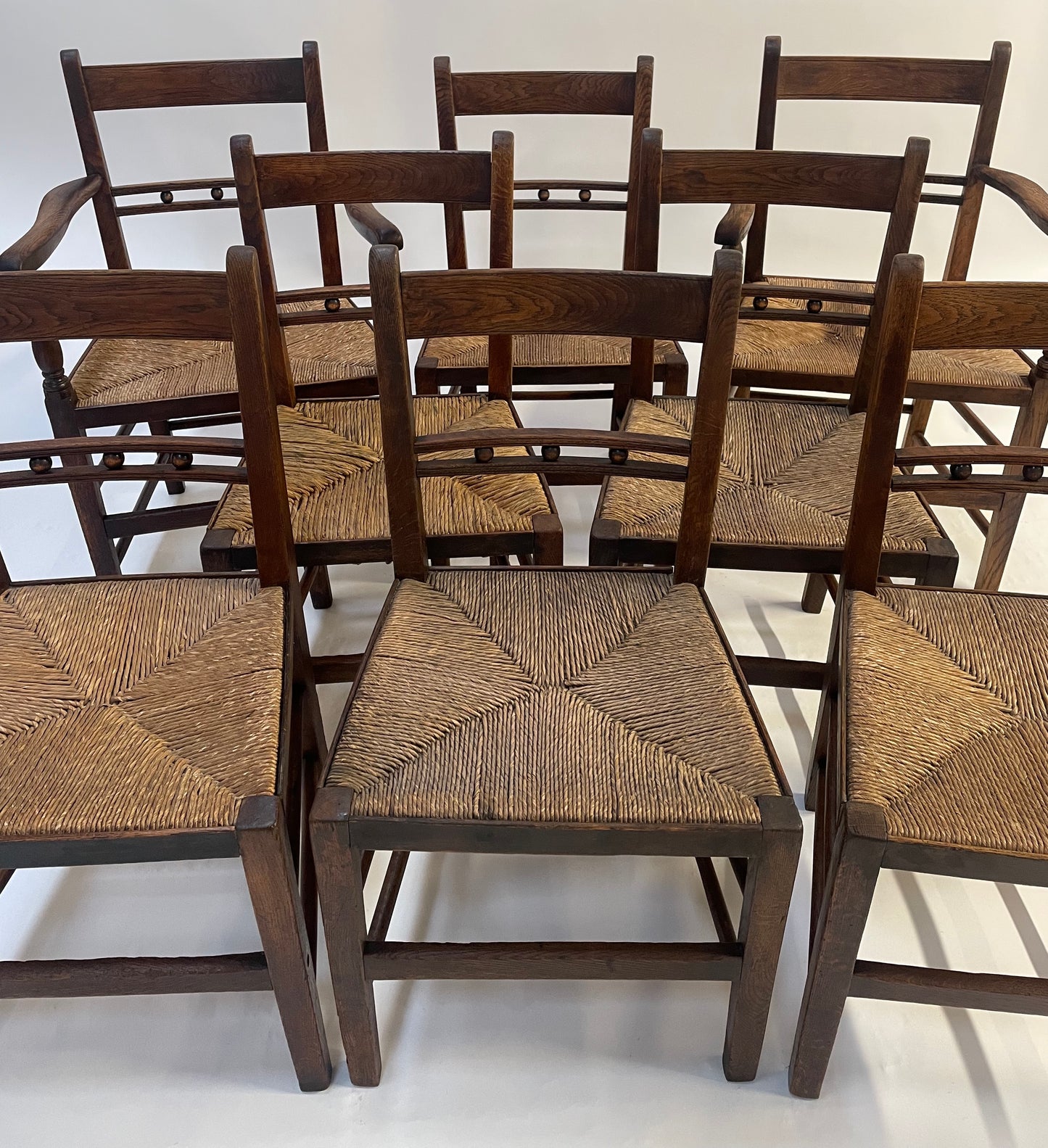 Set of 8 George III Oak, rush seated,country style Dining Chairs.