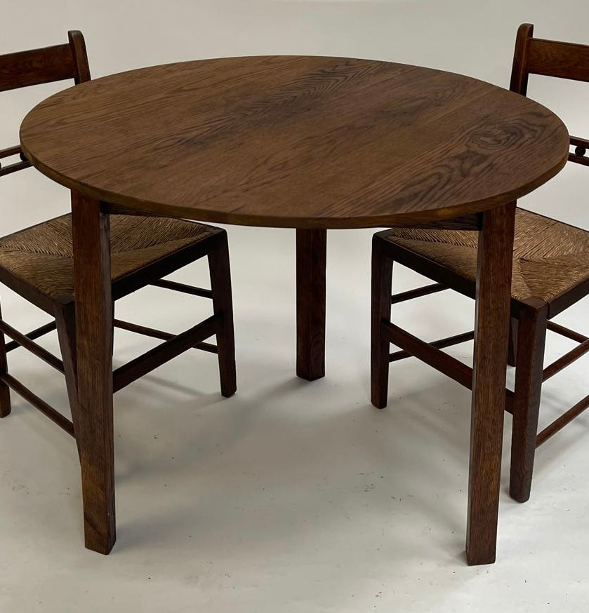A mid century Oak Cricket table