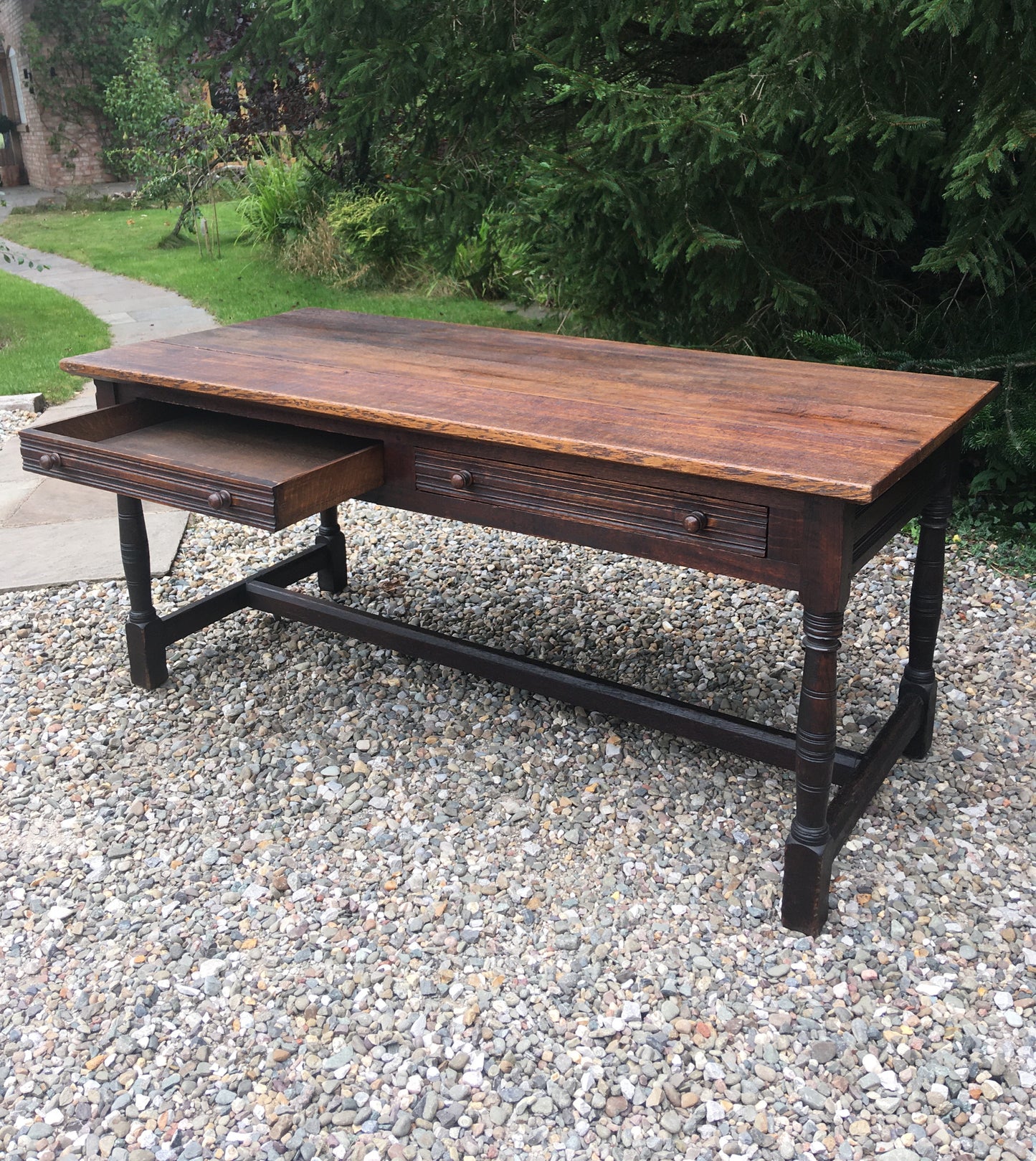 Large antique oak dining table with drawers