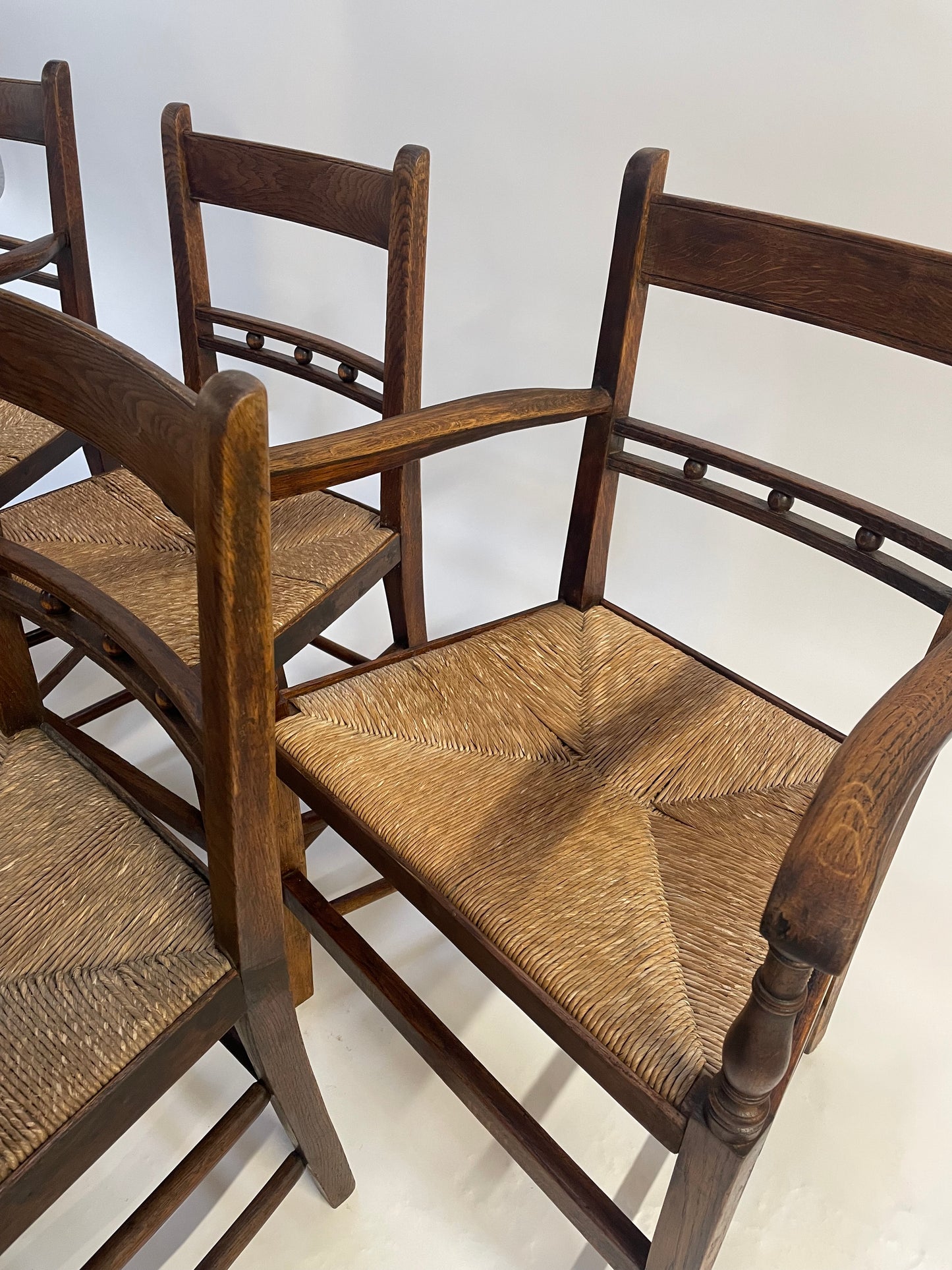 Set of 8 George III Oak, rush seated,country style Dining Chairs.