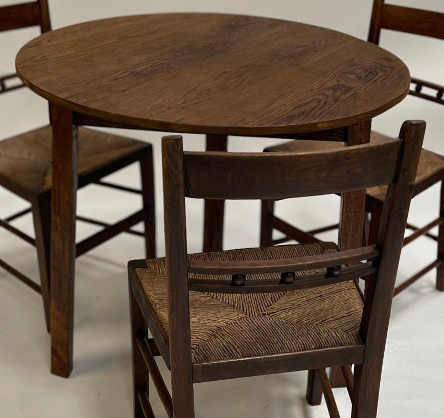 A mid century Oak Cricket table