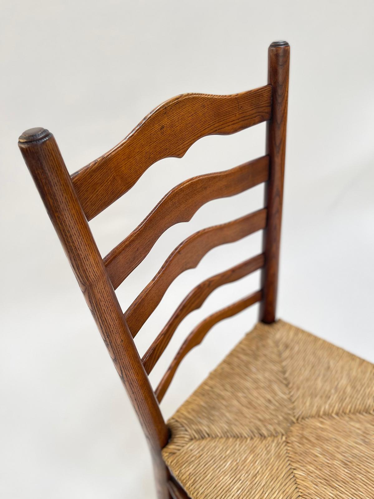 A set of 4 Vintage Ladder Back Dining Chairs