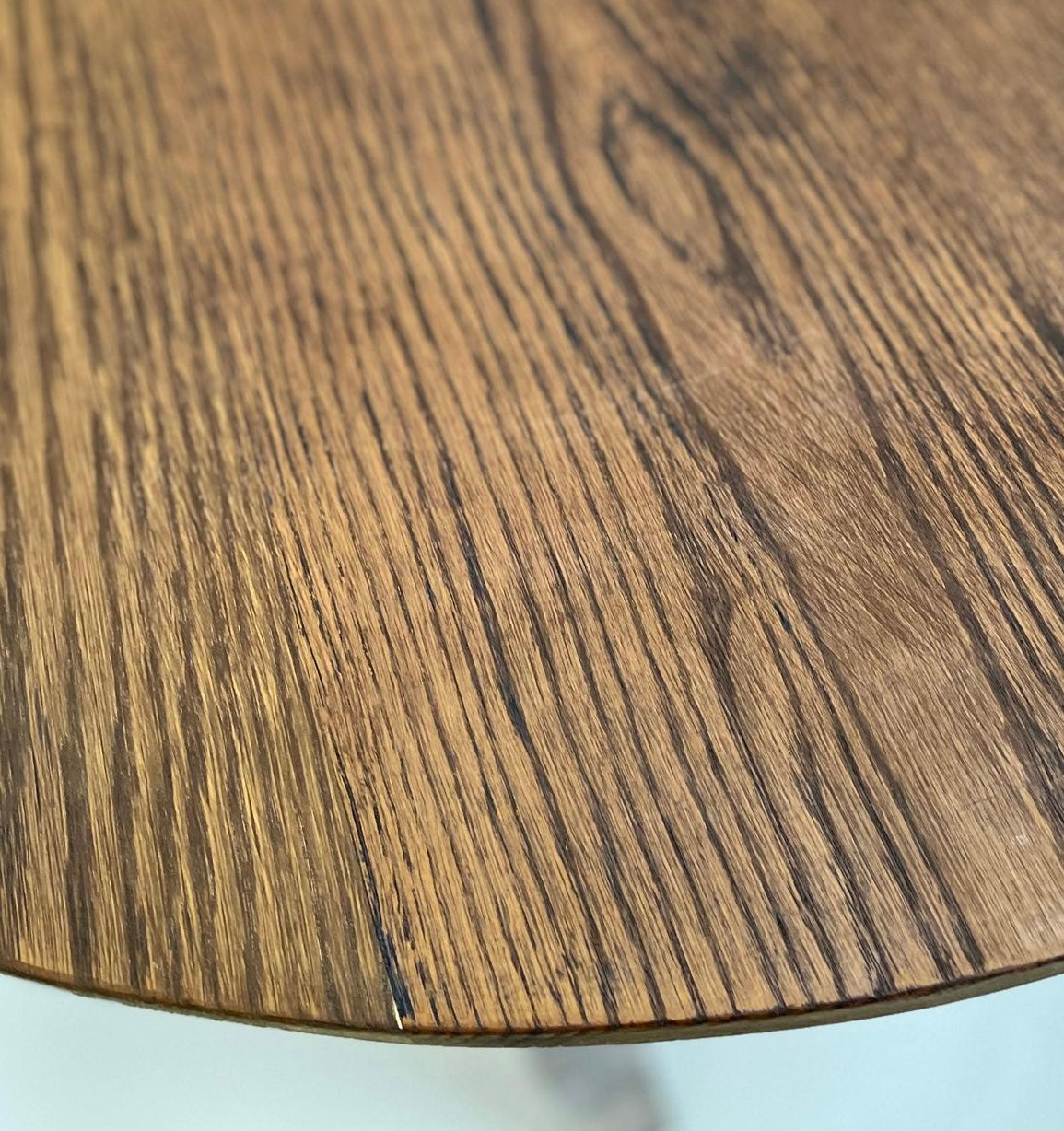 A mid century Oak Cricket table