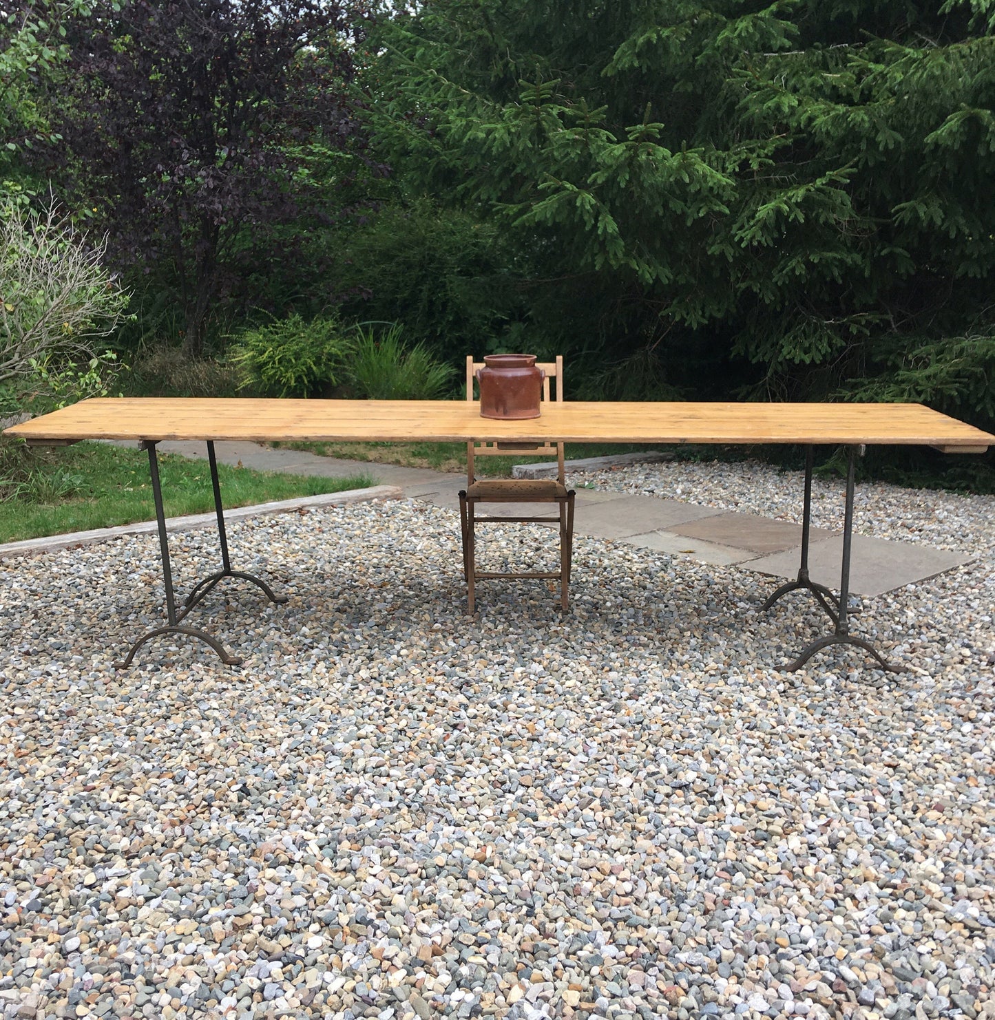 Large vintage pine trestle table with iron legs