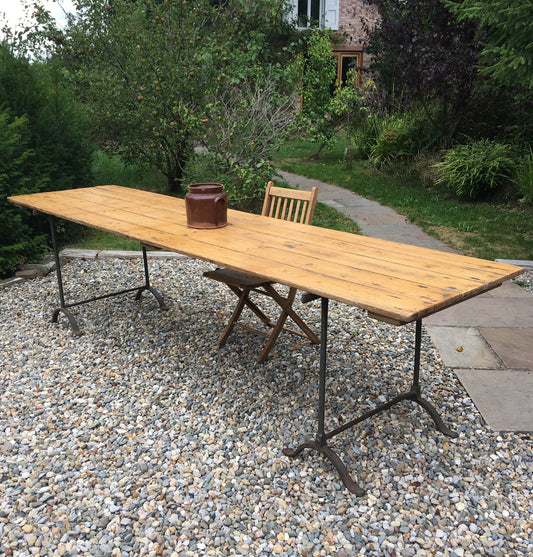 Large vintage pine trestle table with iron legs