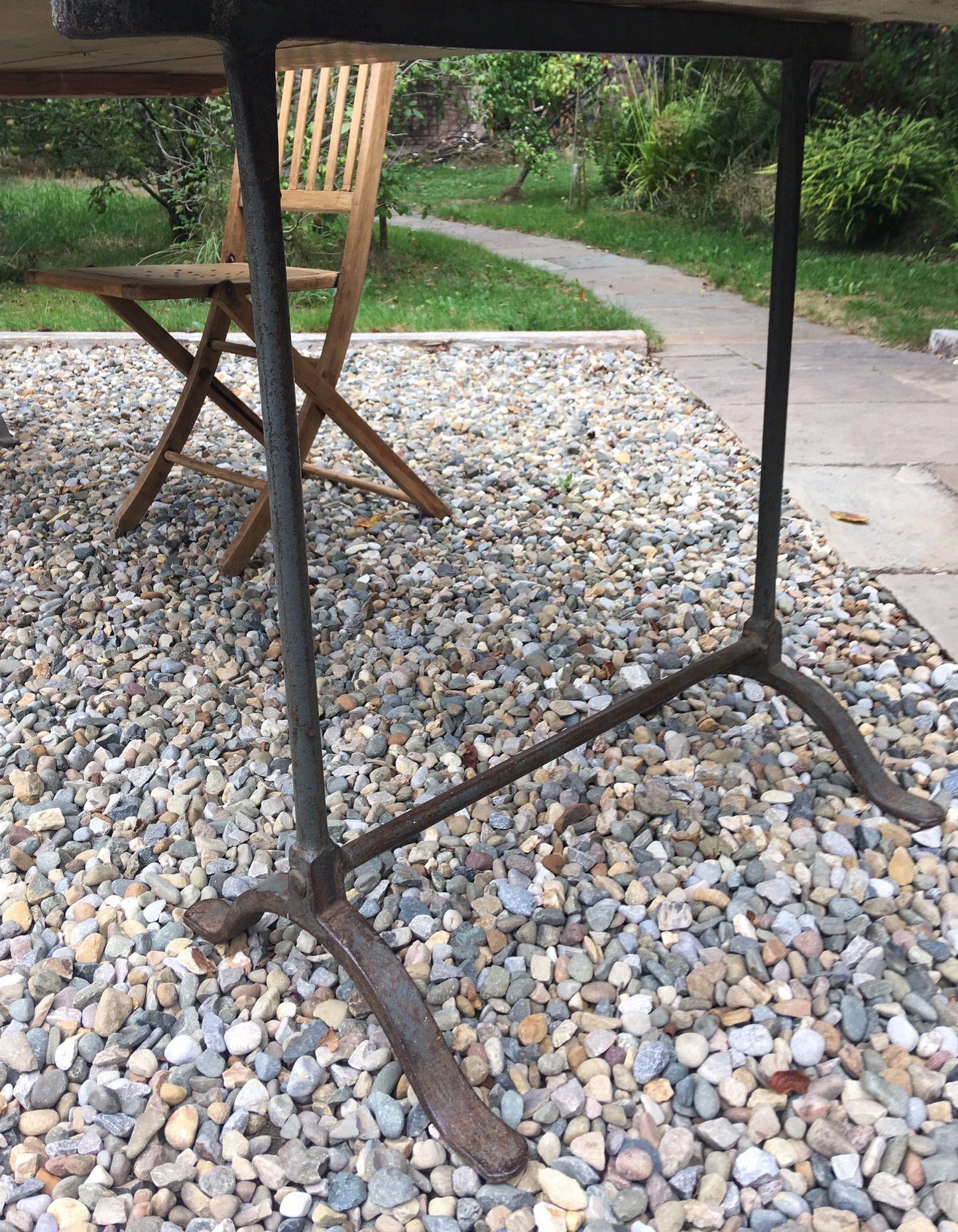 Large vintage pine trestle table with iron legs