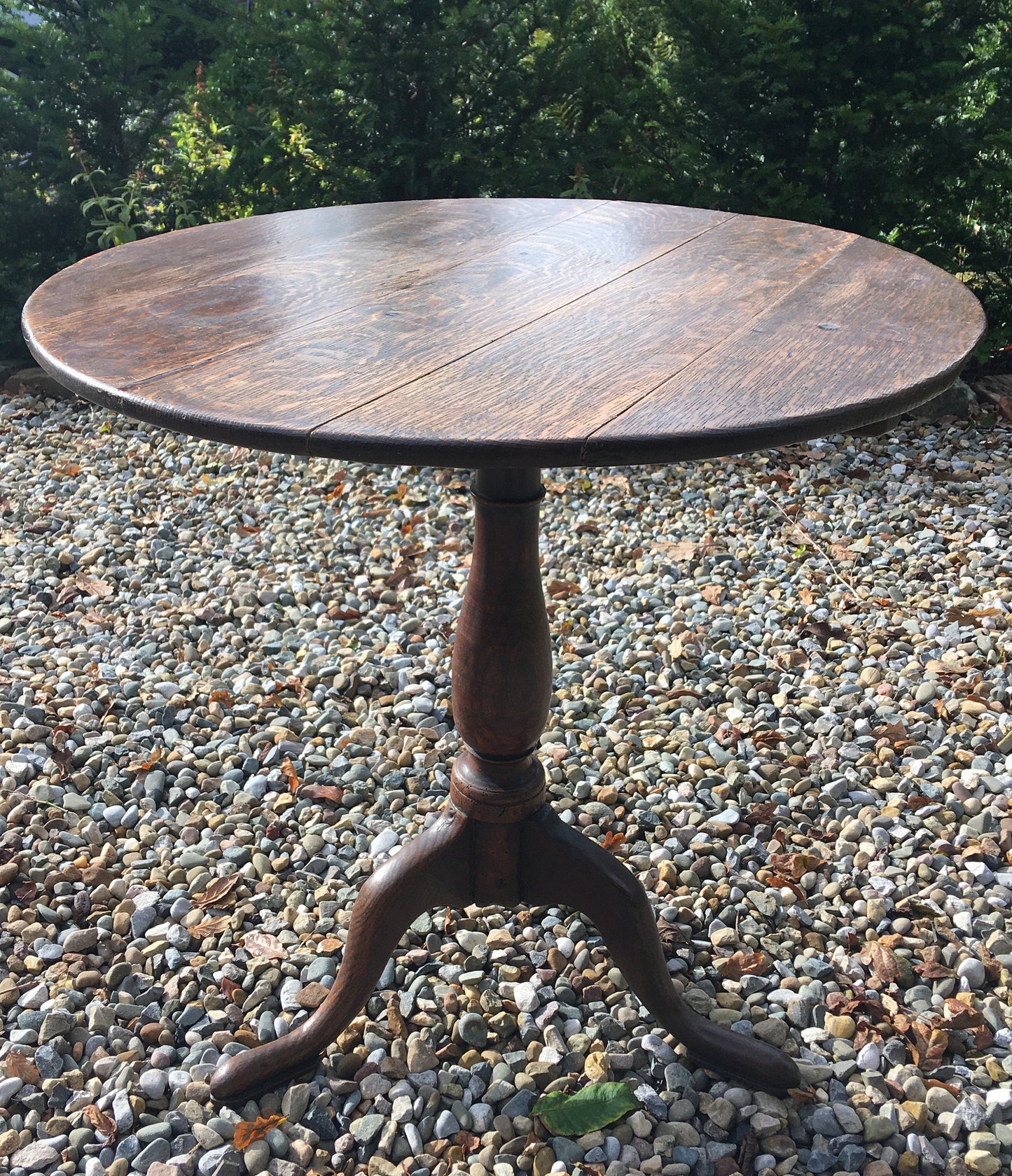 Antique oak tilt top round table