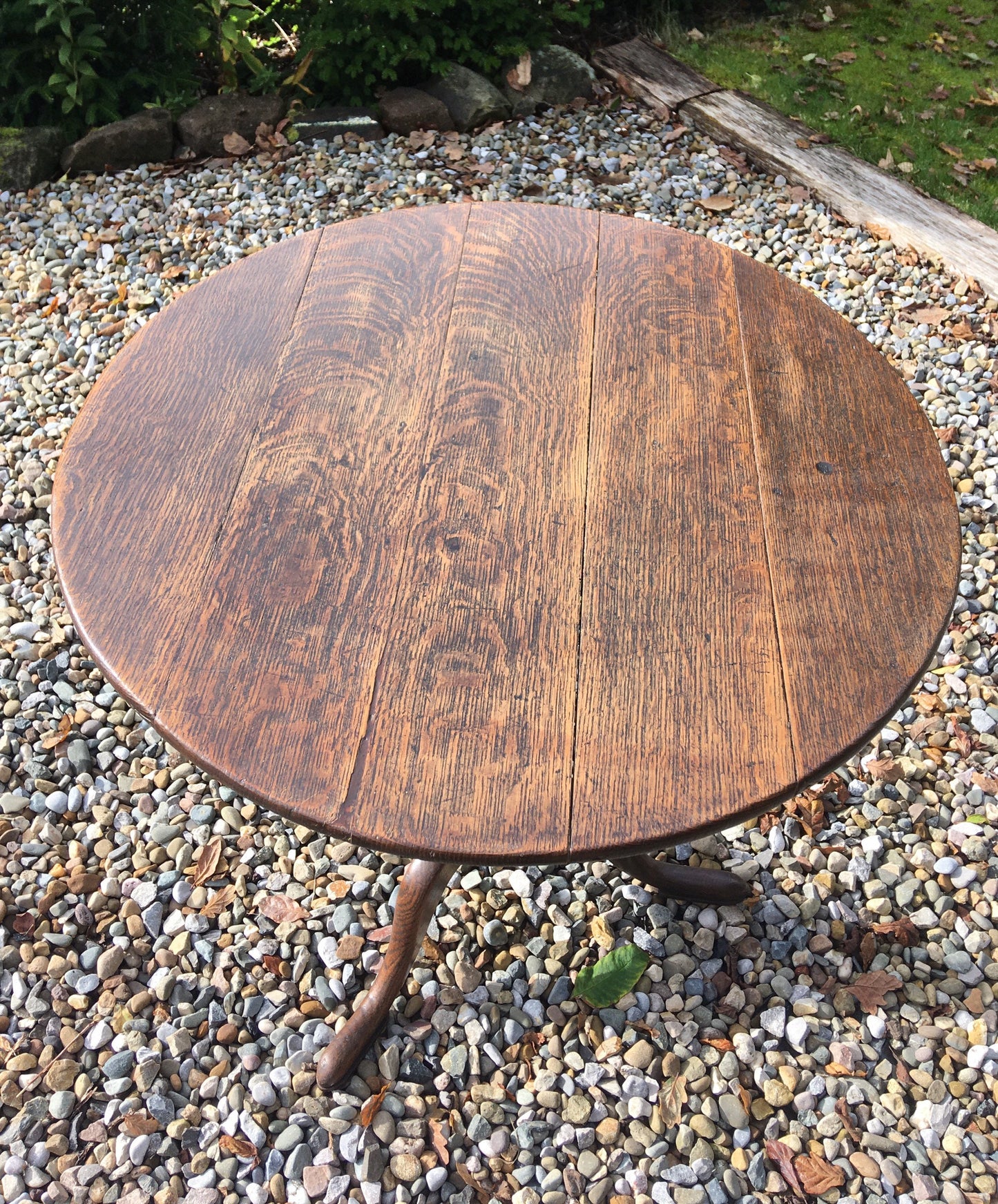 Antique oak tilt top round table